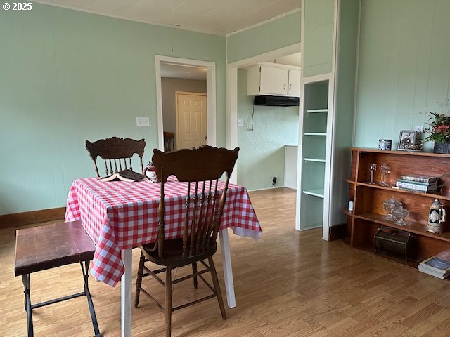 62254 Wallowa Mtn Loop Road Joseph, OR 97846 - Photo 30 of 35 a view of a dining room with furniture and wooden floor