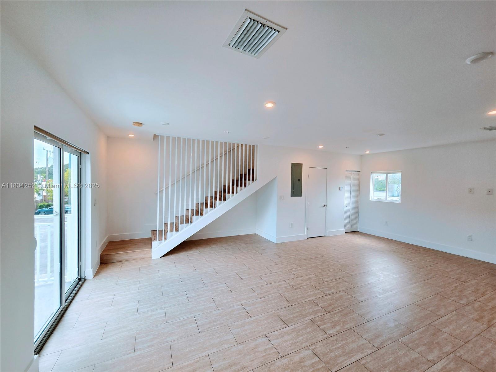 6336 Southwest 27th Street, Unit 8 Miramar, FL 33023 - Photo 4 of 16 a view of an entryway with wooden floor