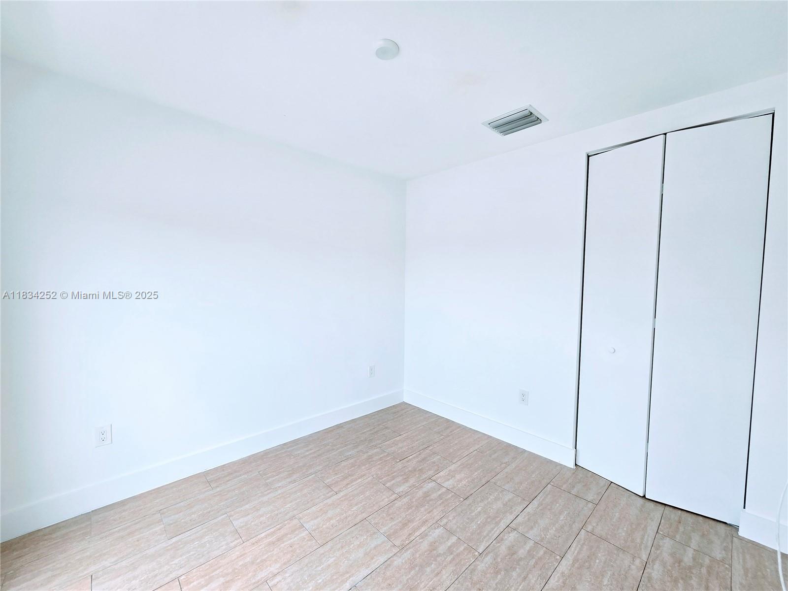 6336 Southwest 27th Street, Unit 8 Miramar, FL 33023 - Photo 9 of 16 a view of an empty room