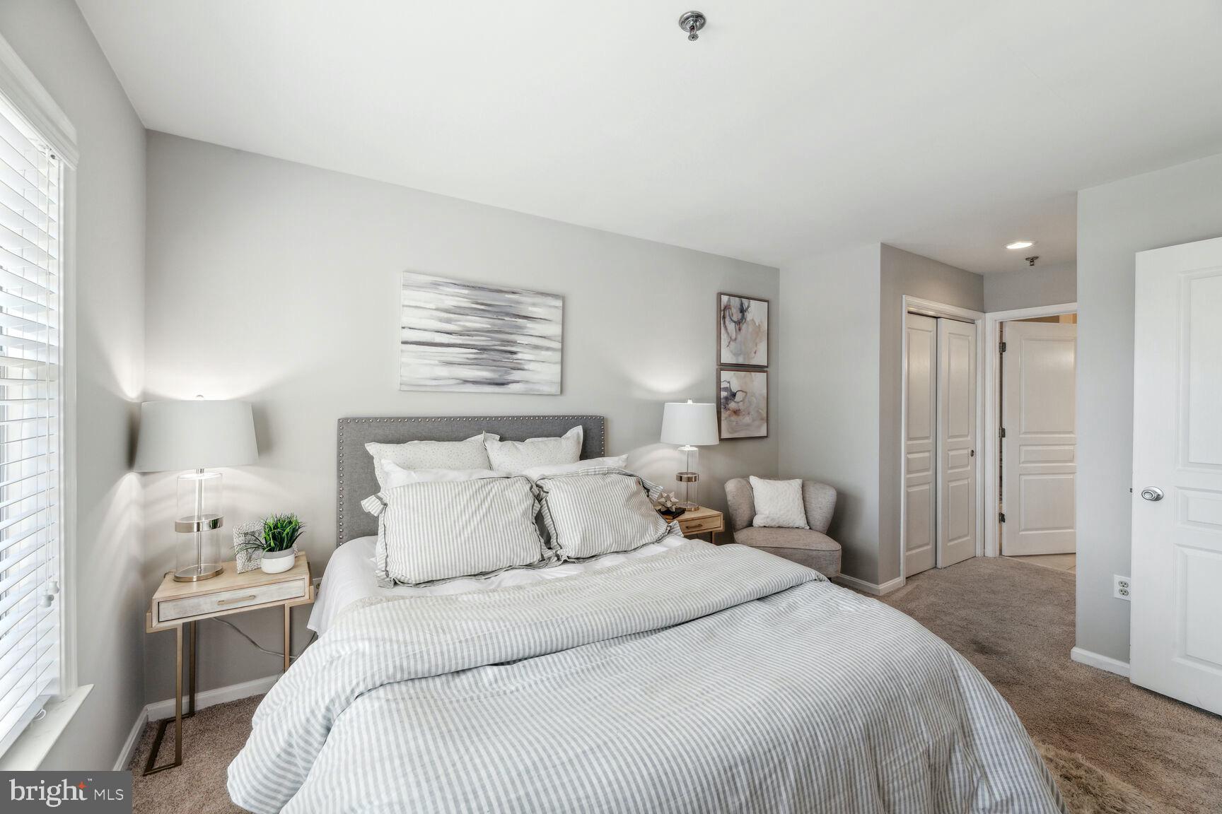 5573 Seminary Road, Unit 413 Falls Church, VA 22041 - Photo 11 of 24 Primary bedroom with ensuite & his/her closets