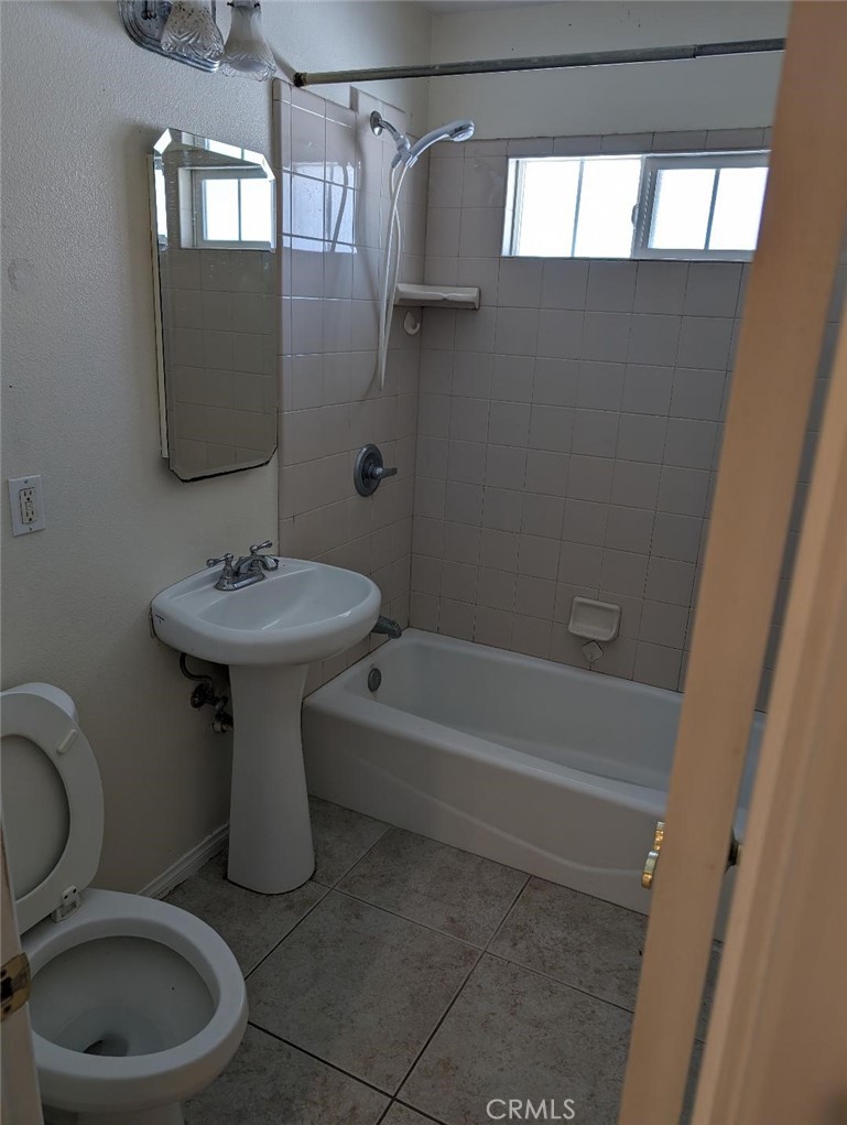 5331 Sunnyside Drive Riverside, CA 92504 - Photo 19 of 25 a bathroom with a sink toilet and shower