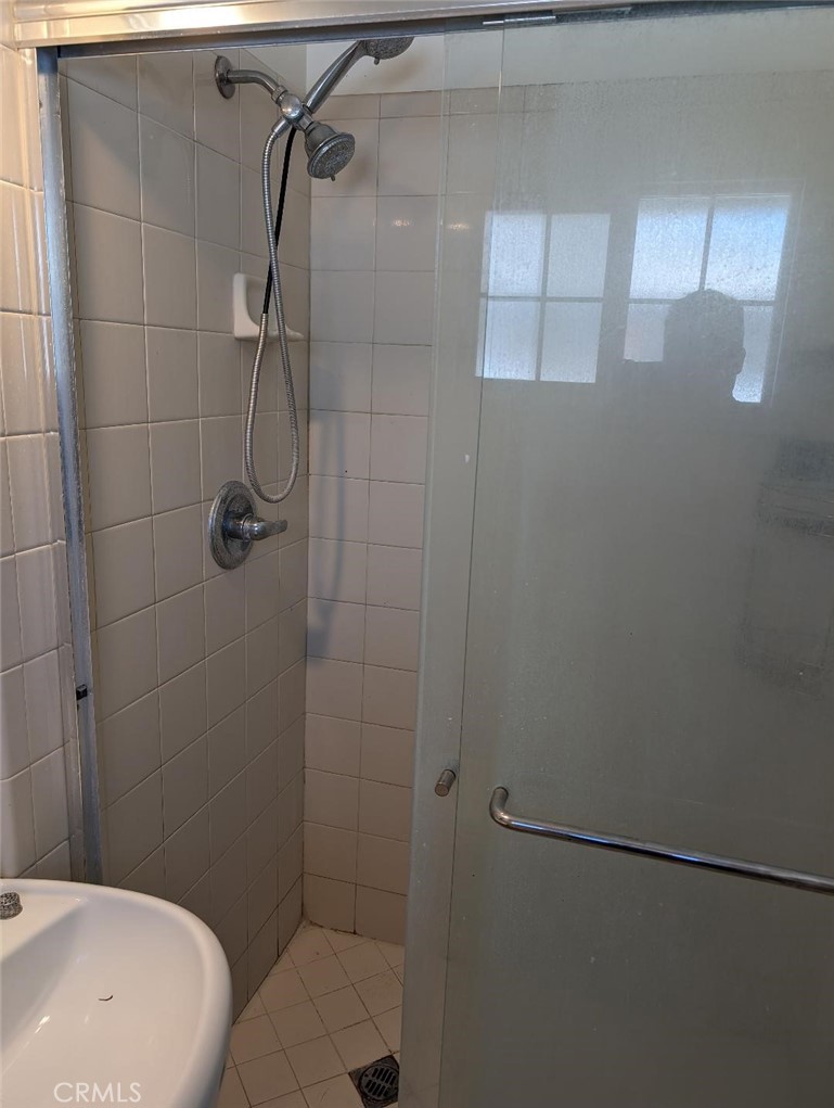 5331 Sunnyside Drive Riverside, CA 92504 - Photo 23 of 25 a bathroom with a toilet and shower