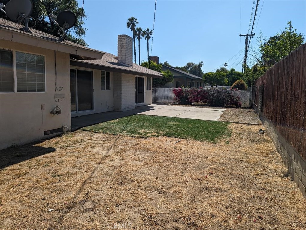 5331 Sunnyside Drive Riverside, CA 92504 - Photo 4 of 25 a front view of a house with a yard