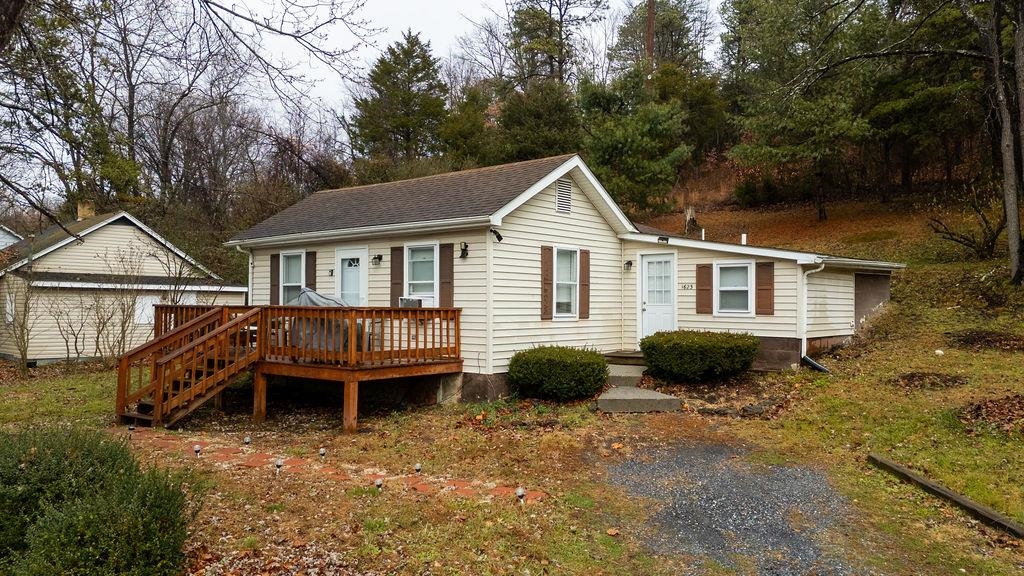 1623 East Main Street Waynesboro, VA 22980 - Photo 17 of 20 a view of house with yard outdoor seating and barbeque oven