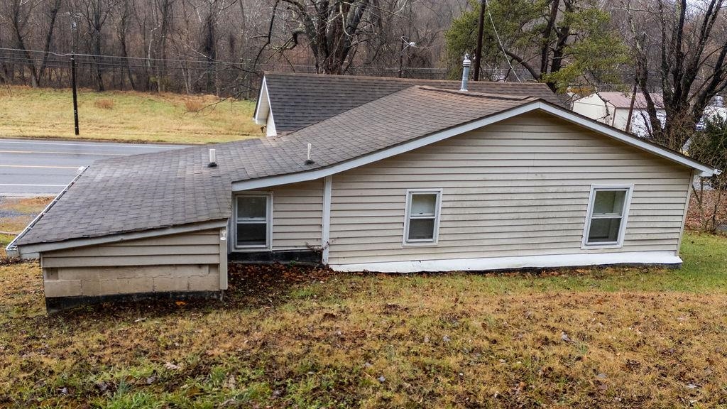 1623 East Main Street Waynesboro, VA 22980 - Photo 19 of 20 a view of a backyard with a small cabin
