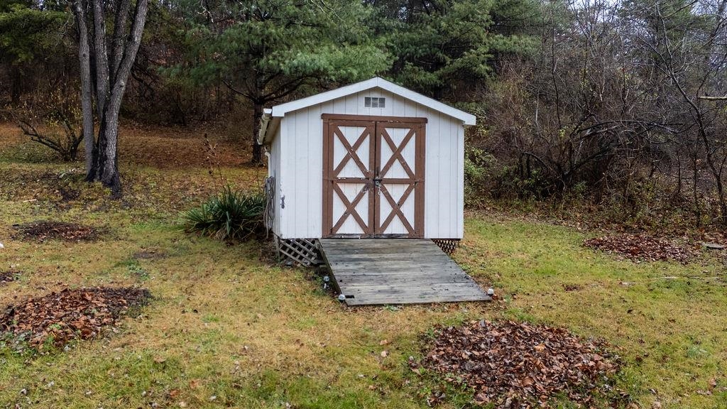 1623 East Main Street Waynesboro, VA 22980 - Photo 20 of 20 a front view of a house with garden