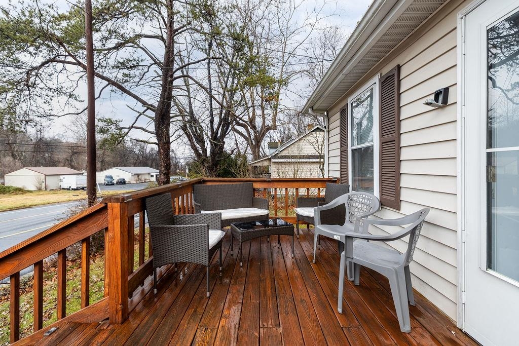 1623 East Main Street Waynesboro, VA 22980 - Photo 2 of 20 a view of a balcony with chairs