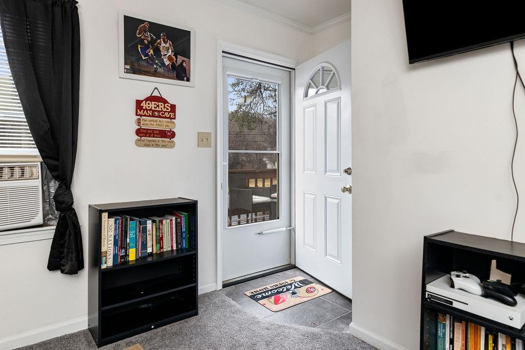 1623 East Main Street Waynesboro, VA 22980 - Photo 3 of 20 a view of an entryway with wooden floor and a window