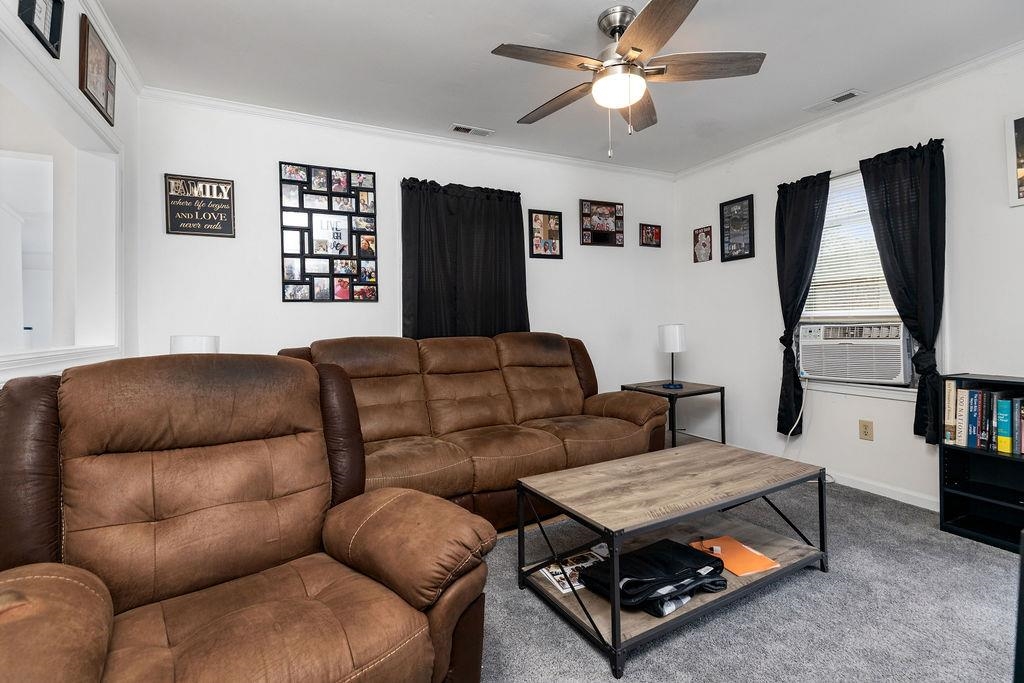 1623 East Main Street Waynesboro, VA 22980 - Photo 4 of 20 a living room with furniture ceiling fan and a window