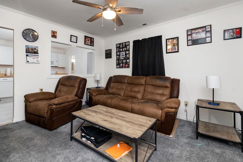 1623 East Main Street Waynesboro, VA 22980 - Photo 5 of 20 a living room with furniture and a flat screen tv