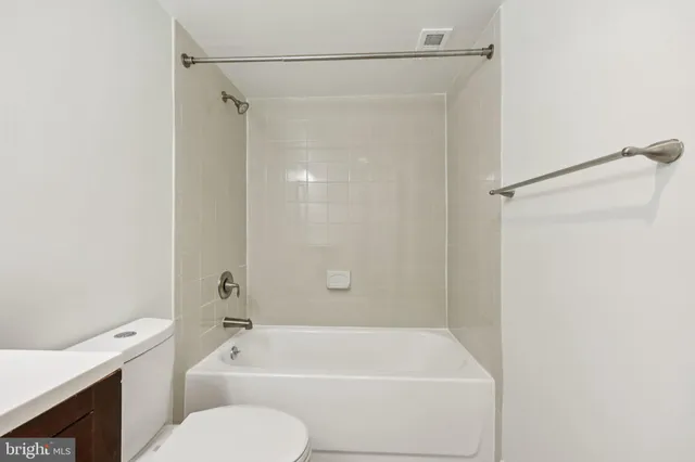 a view of balcony with floor to ceiling window and wooden floor