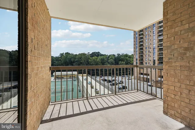 a view of bathroom with a shower and a sink