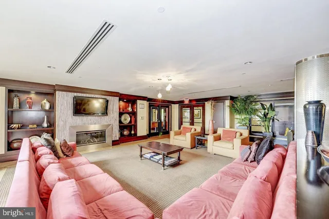 a living room with furniture and a couch