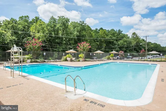 a view of a porch with furniture and a table