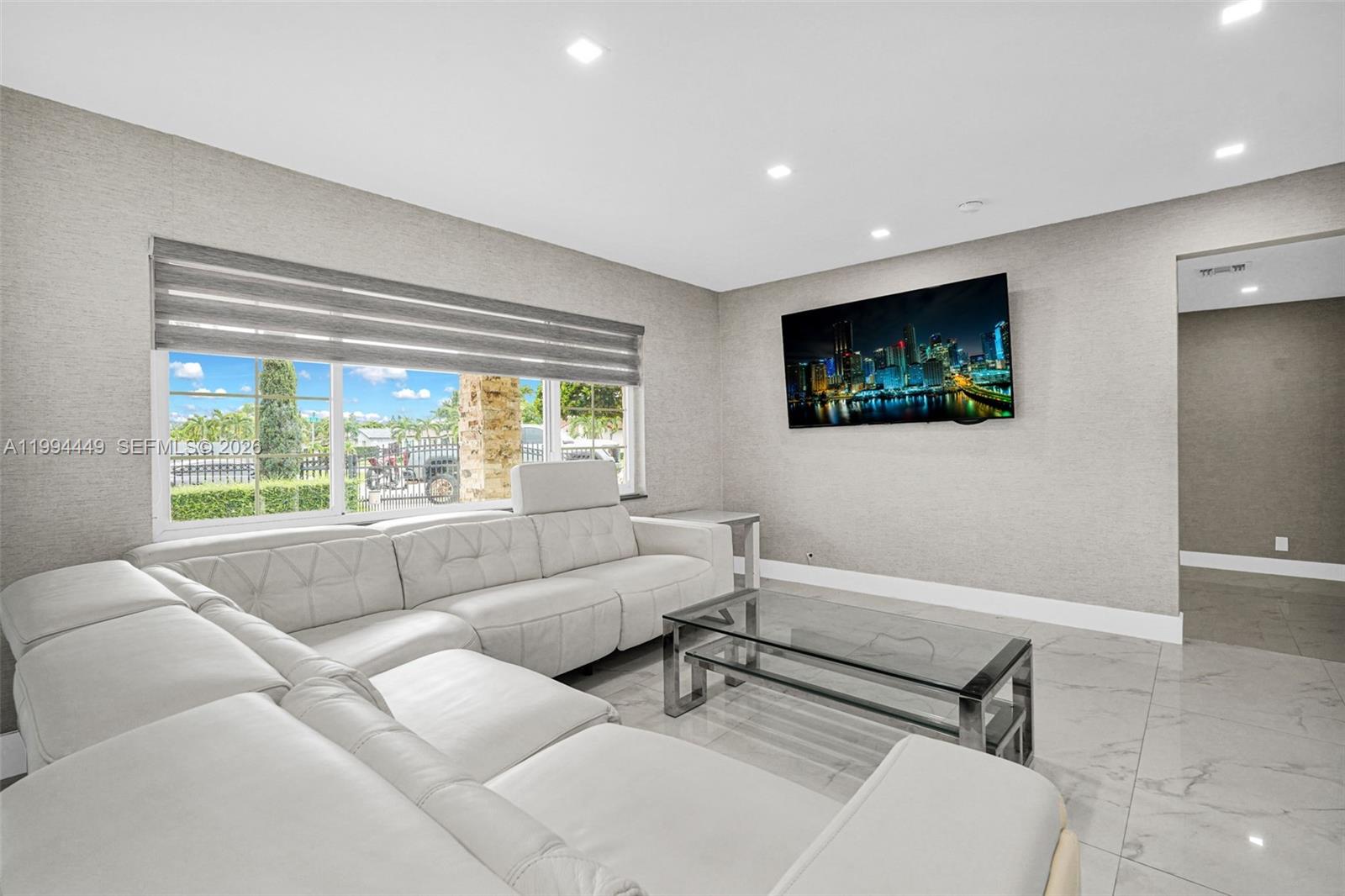 4225 Southwest 133rd Court Miami, FL 33175 - Photo 14 of 53 a living room with furniture and a flat screen tv