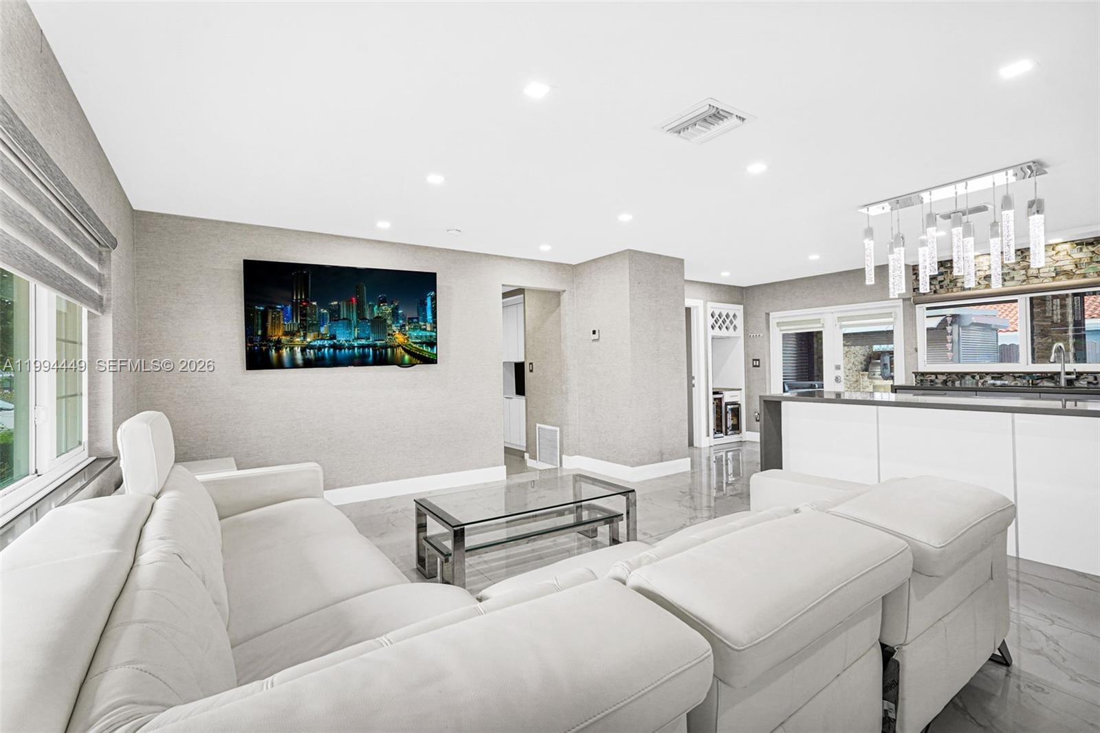 4225 Southwest 133rd Court Miami, FL 33175 - Photo 15 of 53 a living room with furniture and a flat screen tv