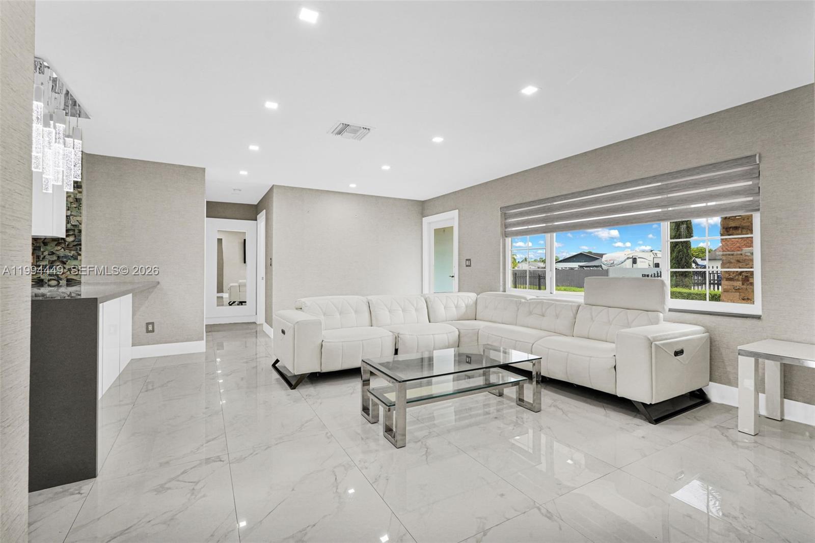 4225 Southwest 133rd Court Miami, FL 33175 - Photo 17 of 53 a living room with furniture and white walls