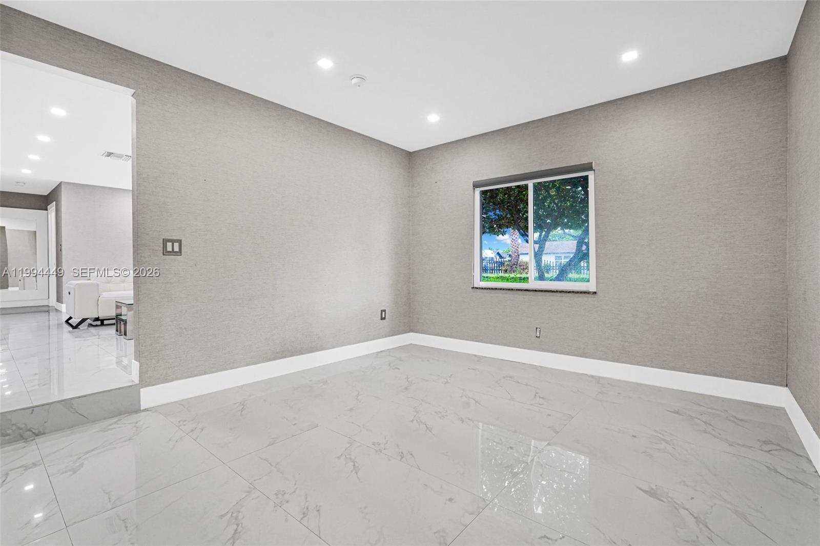 4225 Southwest 133rd Court Miami, FL 33175 - Photo 20 of 53 an empty room with a empty space and windows