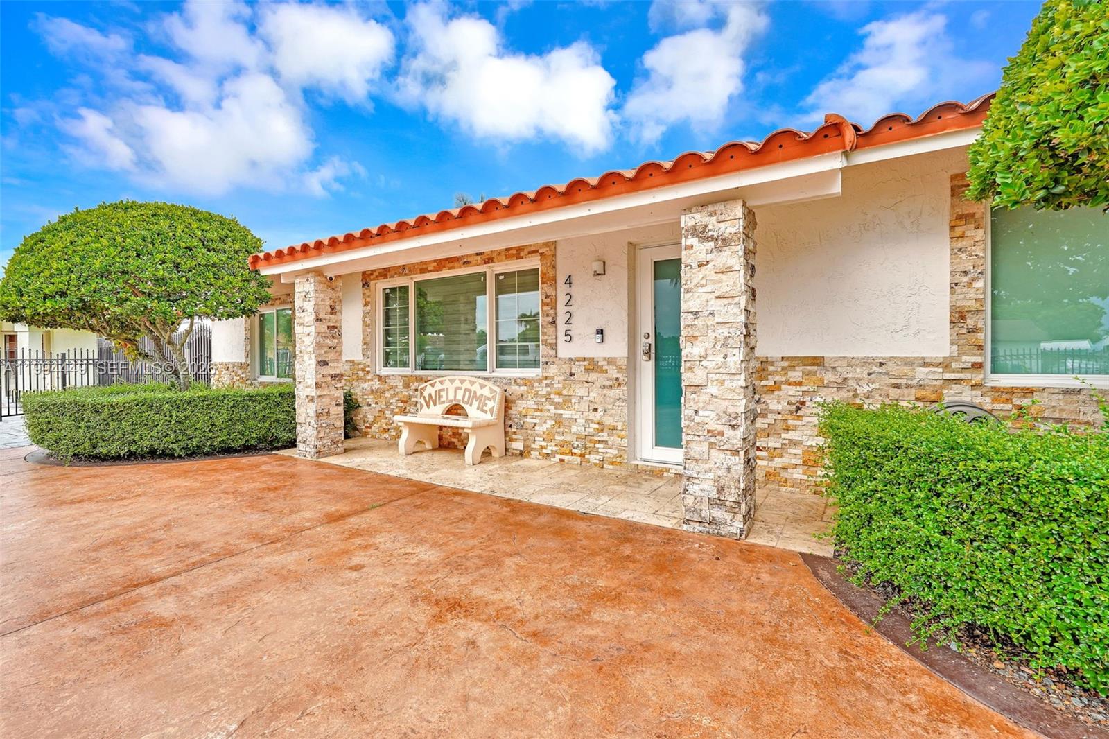 4225 Southwest 133rd Court Miami, FL 33175 - Photo 50 of 53 a front view of a house with a yard