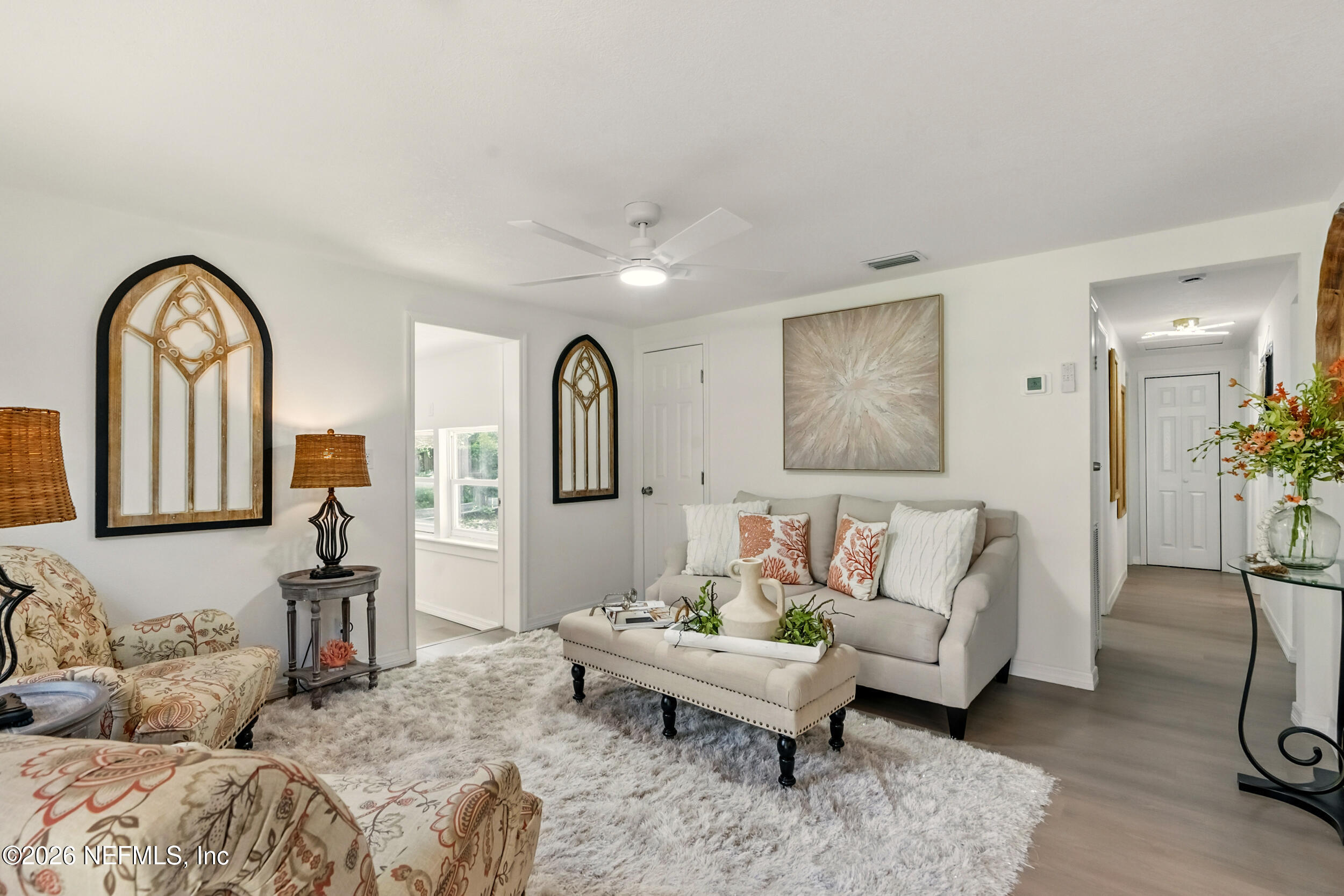 3530 Shadow Street Jacksonville, FL 32254 - Photo 12 of 32 a living room with furniture and a large window