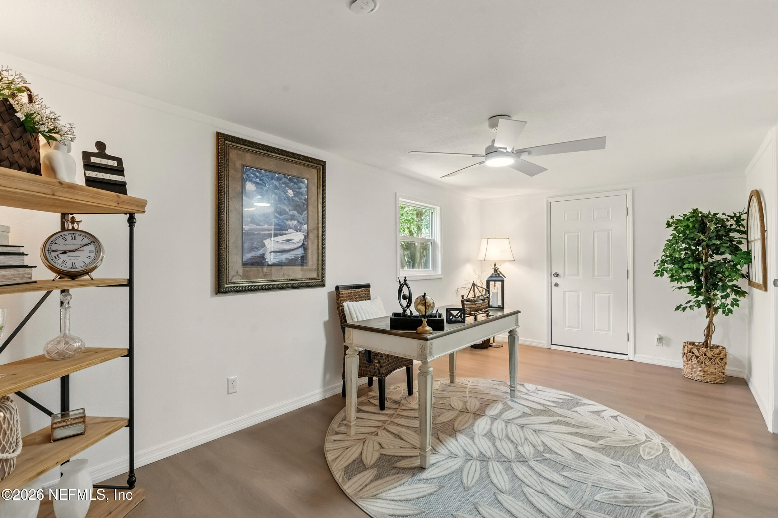 3530 Shadow Street Jacksonville, FL 32254 - Photo 17 of 32 a living room with furniture a potted plant and a table