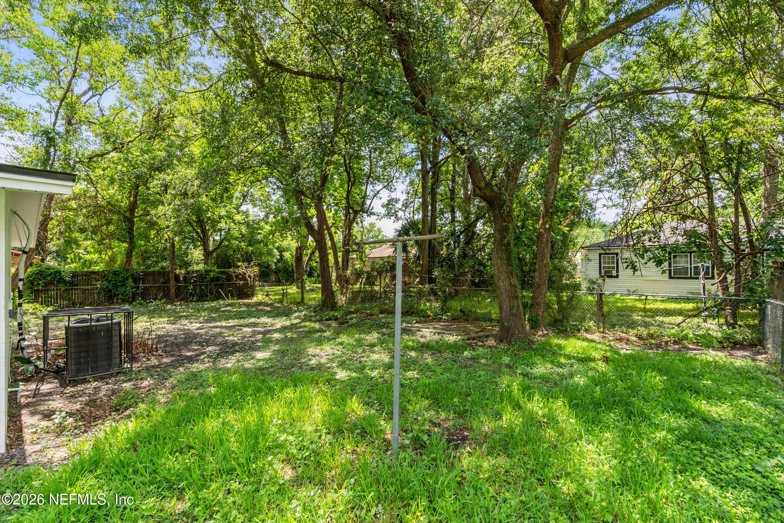 3530 Shadow Street Jacksonville, FL 32254 - Photo 28 of 32 a view of a backyard with a trees