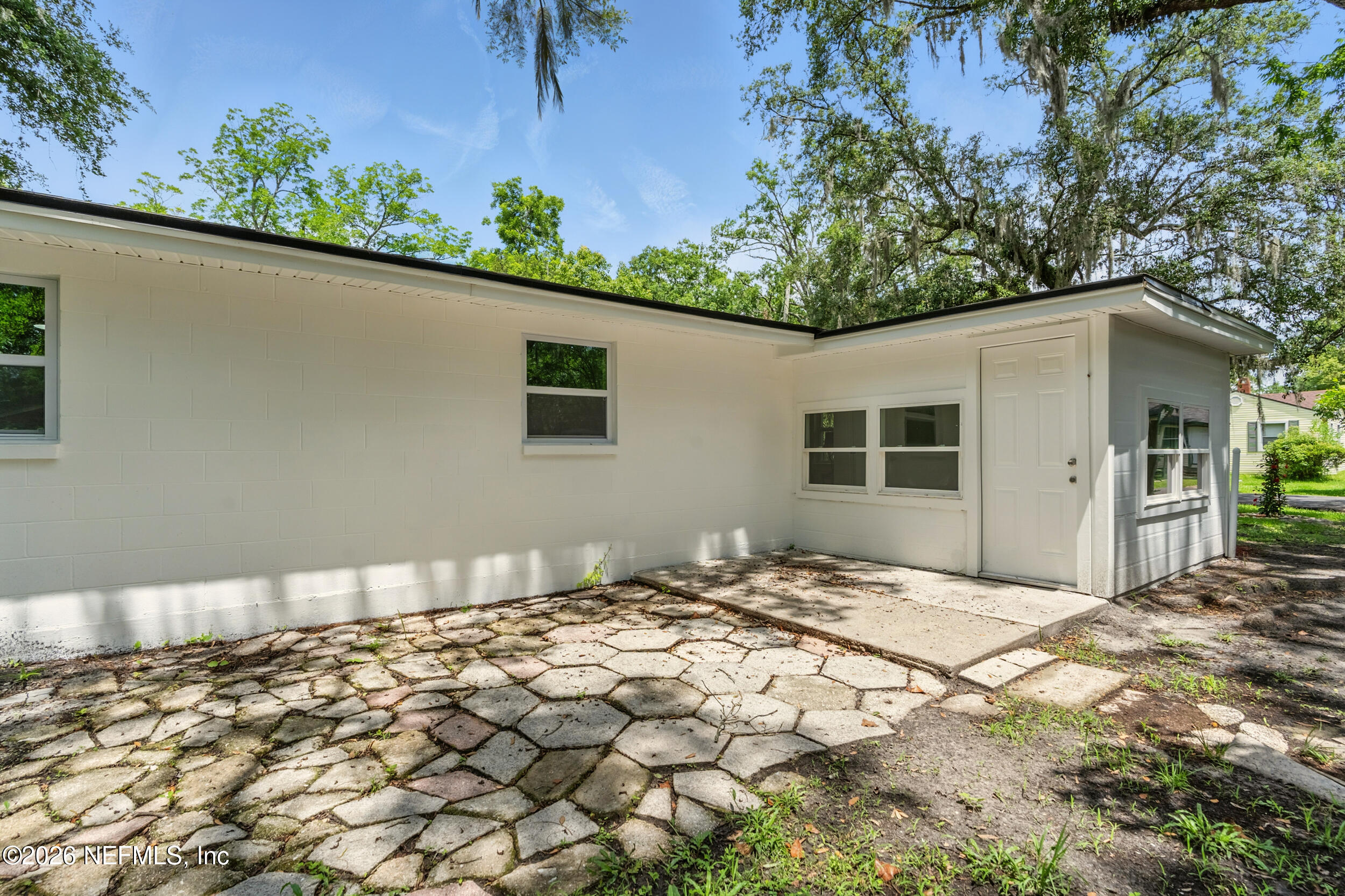 3530 Shadow Street Jacksonville, FL 32254 - Photo 29 of 32 a front view of a house with a yard
