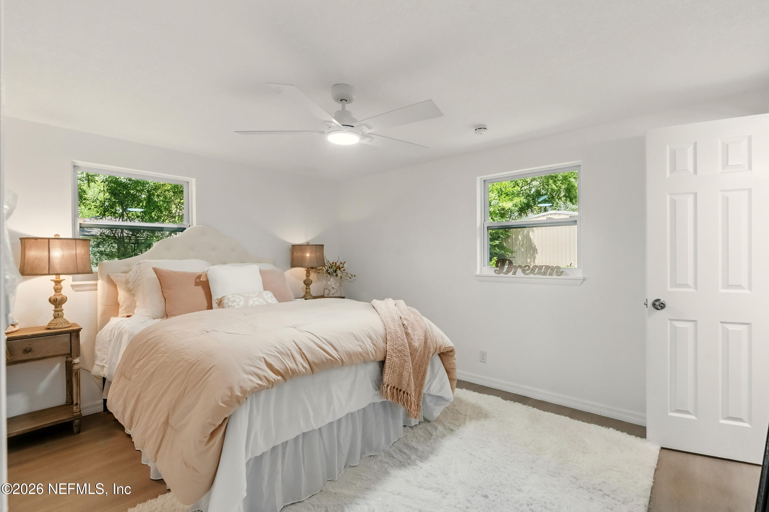3530 Shadow Street Jacksonville, FL 32254 - Photo 5 of 32 a bedroom with a bed and a window