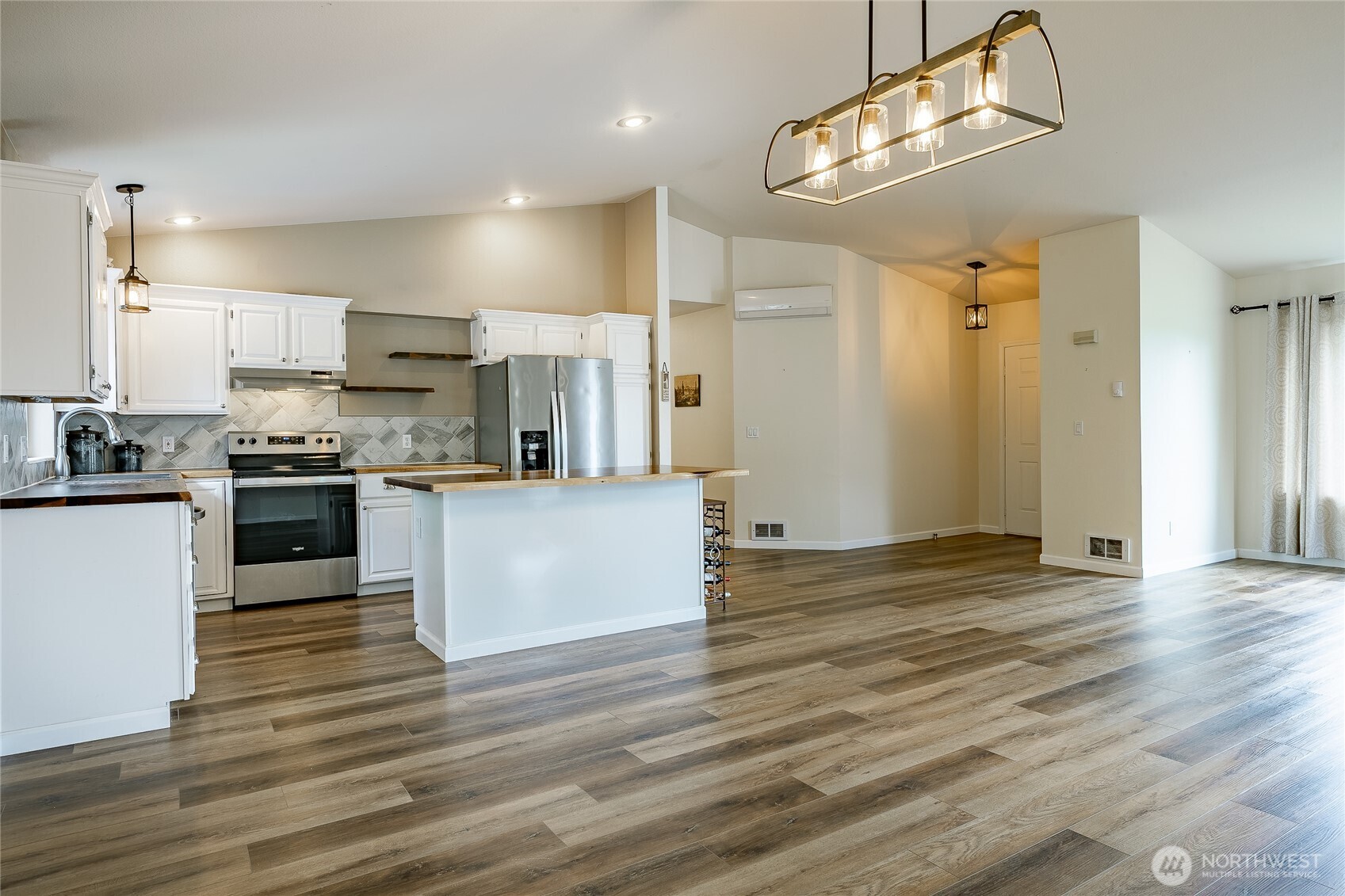 8209 Comox Road Birch Bay, WA 98230 - Photo 5 of 26 a view of kitchen with cabinets appliances and wooden floor