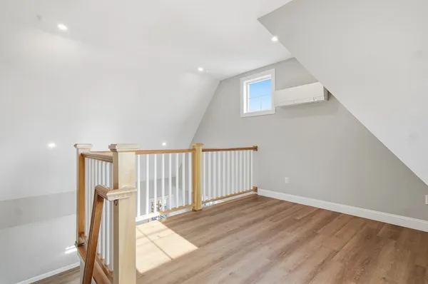 a view of entryway with wooden floor