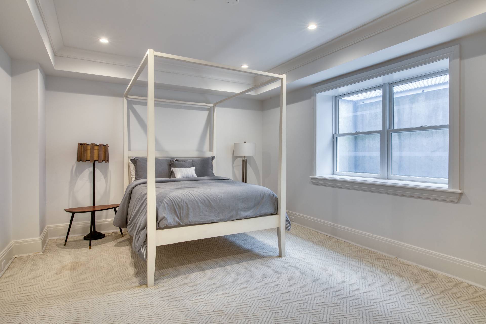 134 Hills Station Road Southampton, NY 11968 - Photo 21 of 33 a bedroom with a bed and a window