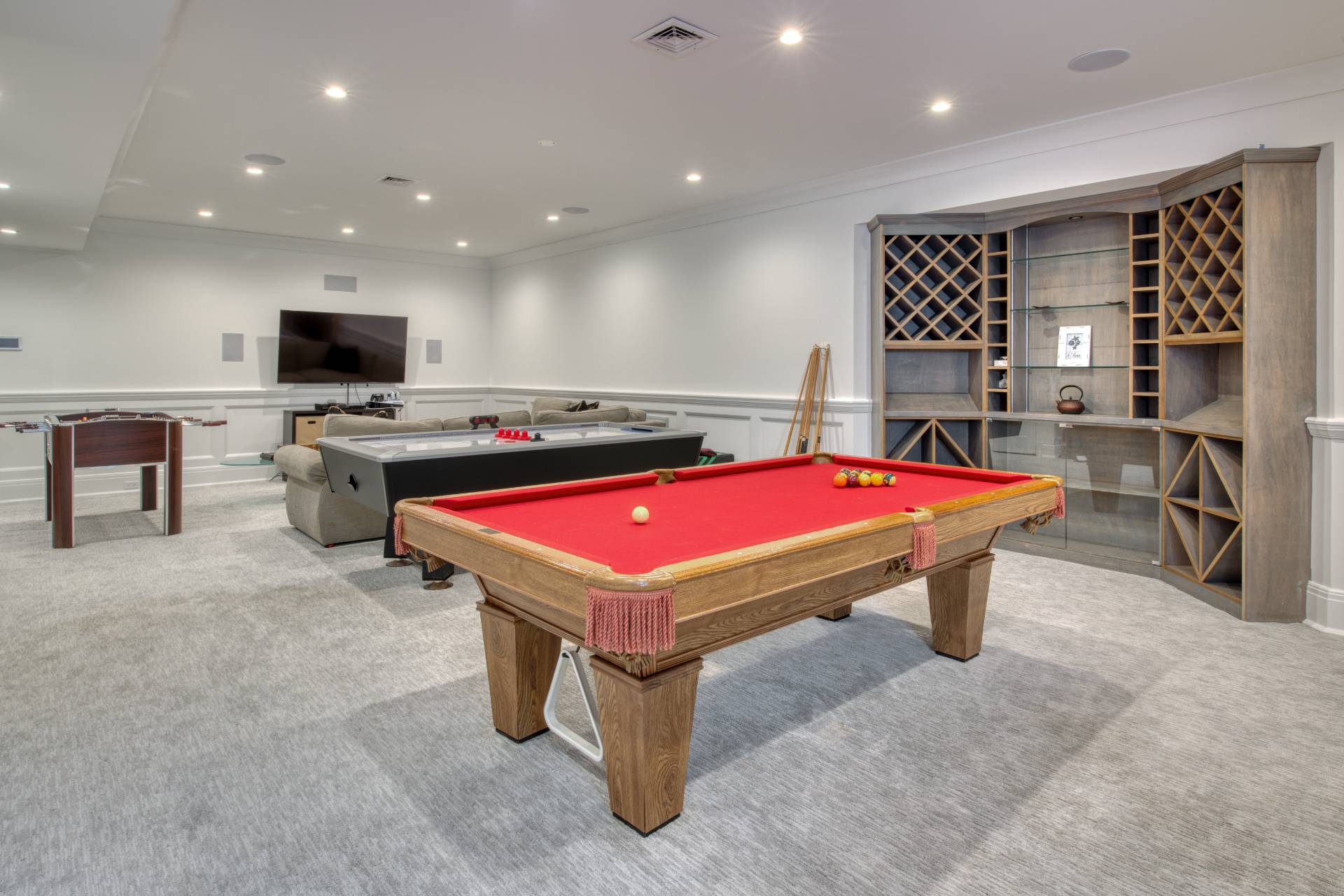 134 Hills Station Road Southampton, NY 11968 - Photo 25 of 33 a room with pool table furniture and a flat screen tv