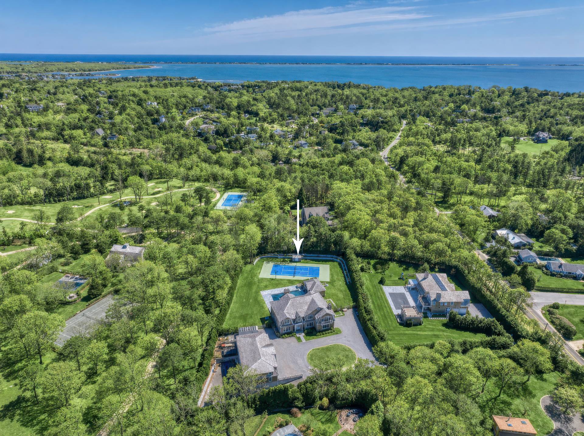 134 Hills Station Road Southampton, NY 11968 - Photo 30 of 33 an aerial view of a house with lots of trees