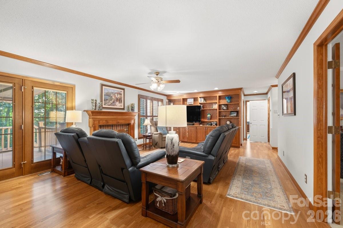 207 Lost Corner Road Morganton, NC 28655 - Photo 23 of 46 a living room with furniture hard wood floor and a flat screen tv
