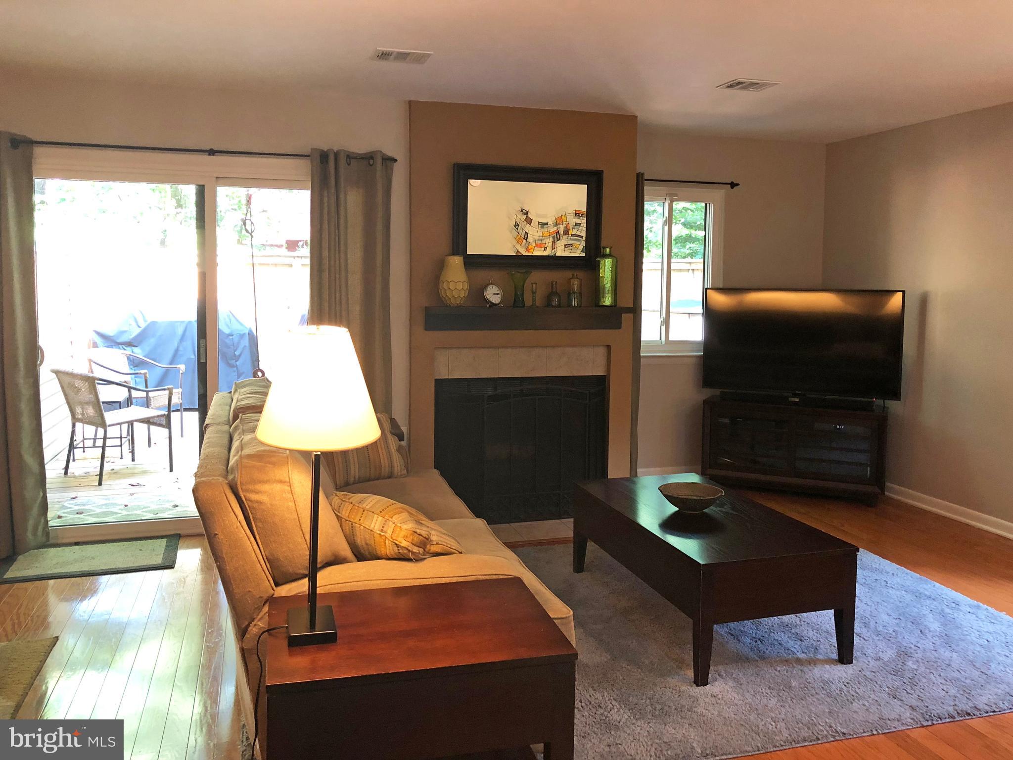 1932 Winterport Cluster Reston, VA 20191 - Photo 20 of 51 Fireplace for winter, sunny deck for summer!