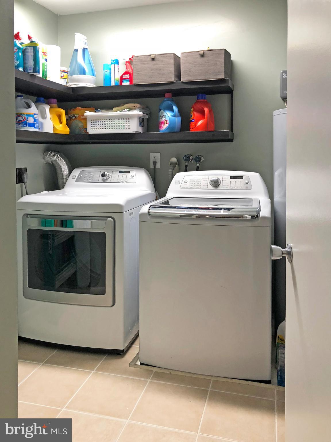 1932 Winterport Cluster Reston, VA 20191 - Photo 49 of 51 Sleek laundry room with upgraded W/D and flooring!