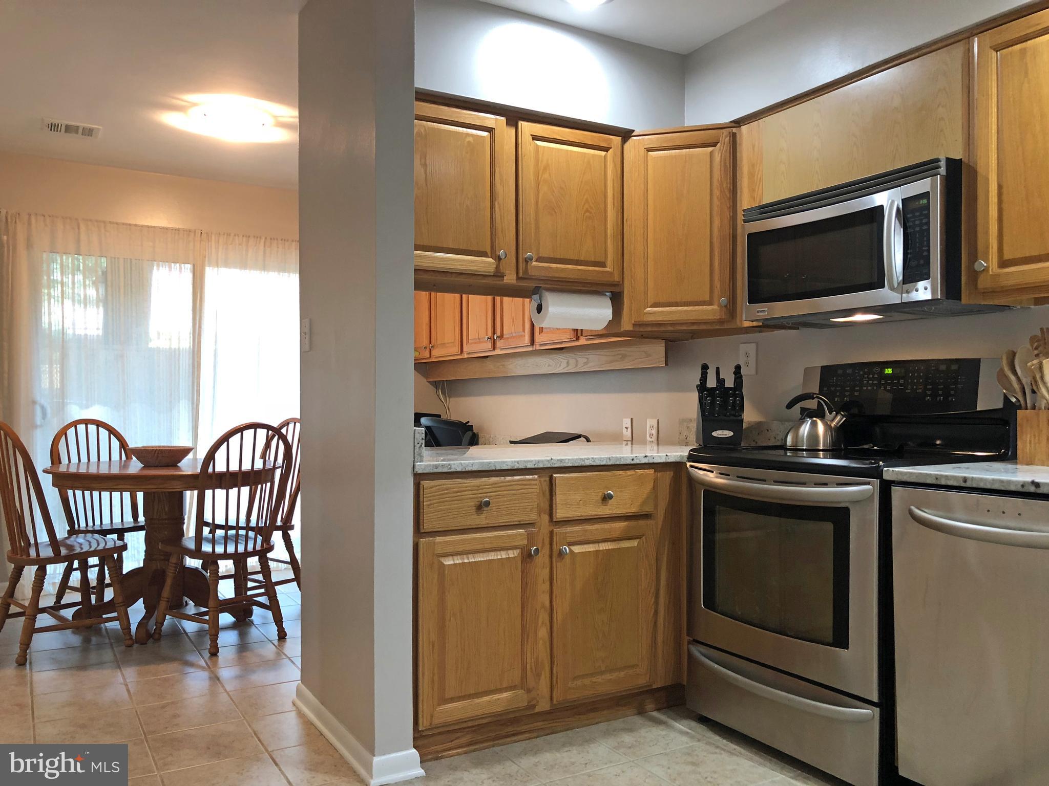 1932 Winterport Cluster Reston, VA 20191 - Photo 9 of 51 View into breakfast area and built in office