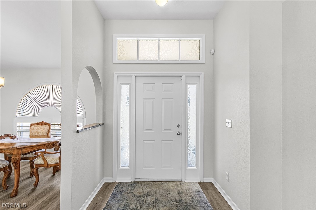 3852 Stabile Road St. James City, FL 33956 - Photo 5 of 27 a view of front door with furniture