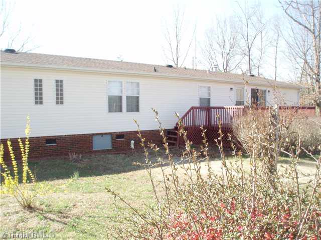 1269 Brims Grove Road Pinnacle, NC 27043 - Photo 9 of 11 Exterior Back. 240 sq.ft. deck