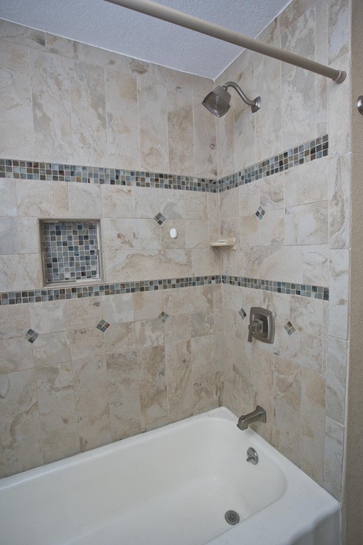 141 Maxwell Road Monson, MA 01057 - Photo 18 of 22 a bathroom with a bathtub and shower