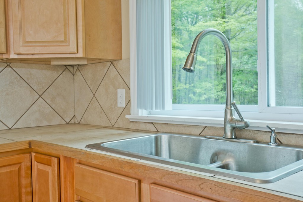 141 Maxwell Road Monson, MA 01057 - Photo 7 of 22 a view closed with a sink and mirror