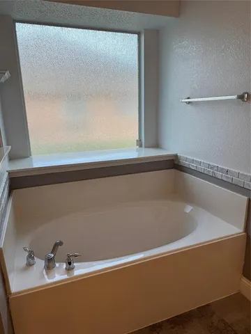 a bathroom with a bathtub