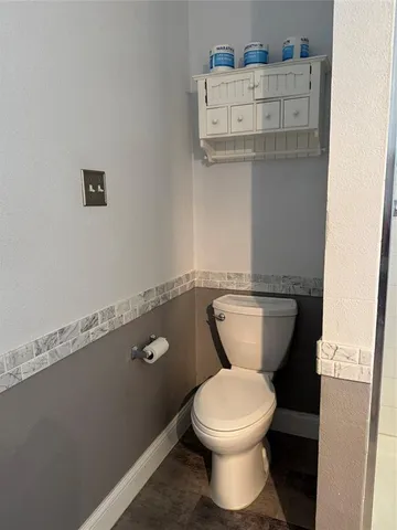 a bathroom with a sink vanity and a mirror
