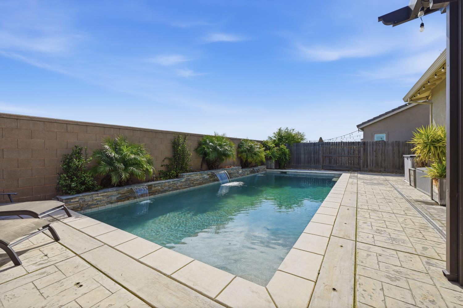 2012 Van Ruiten Drive Lodi, CA 95242 - Photo 40 of 49 a view of swimming pool with a yard