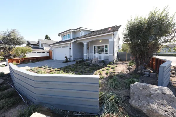 a house view with a outdoor space