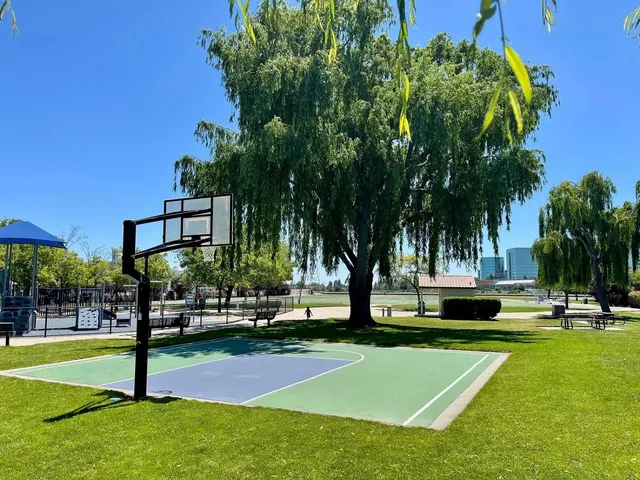 a view of a lake with a big yard