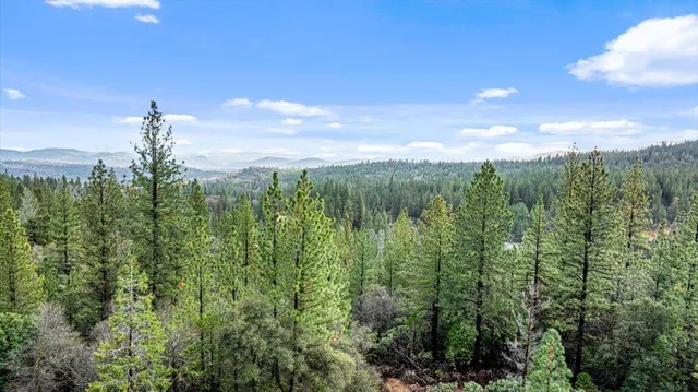 a view of mountain view with mountains in the background