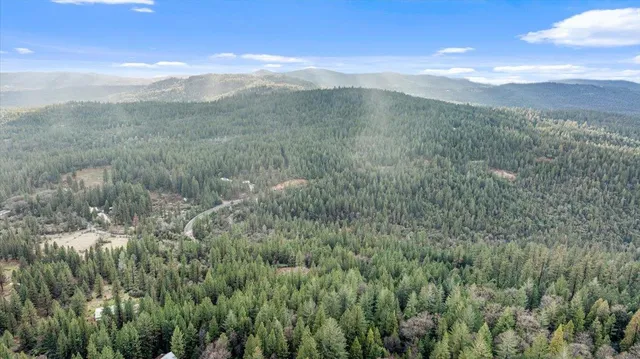 a view of mountain view with mountains in the background