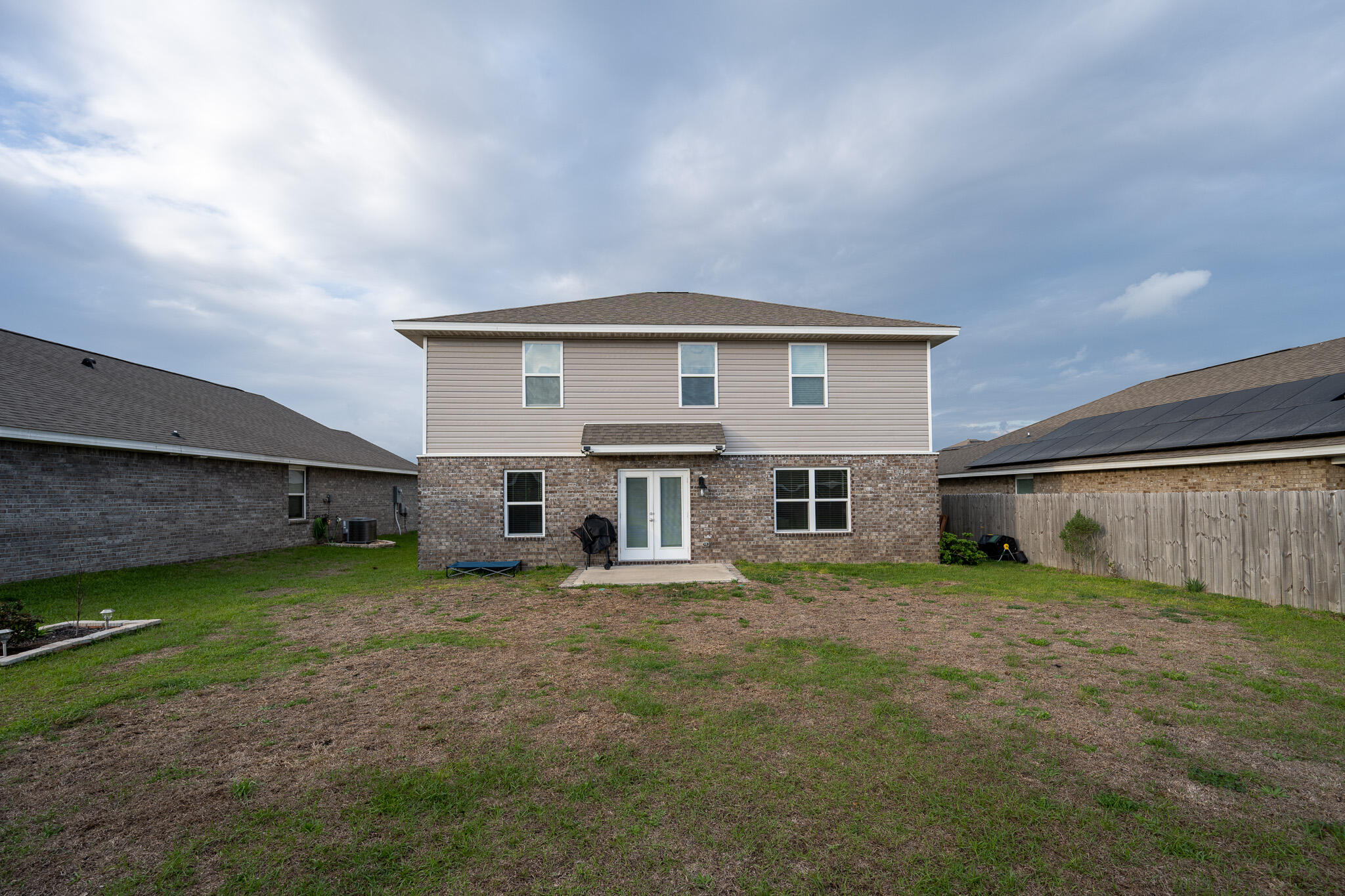 925 Merganser Way Crestview, FL 32539 - Photo 12 of 37 a view of a house with a yard