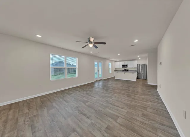 a view of a kitchen with a sink and cabinet area